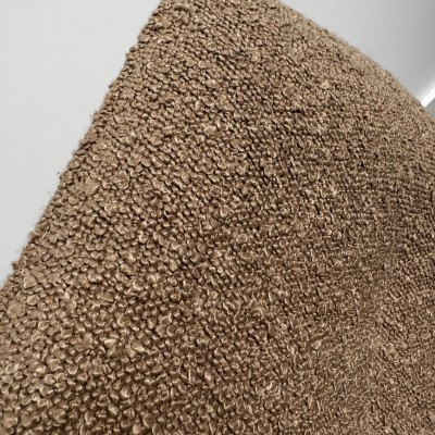 Texture bouclette beige chaise pivotante haut de gamme Texture bouclette beige chaise pivotante haut de gamme